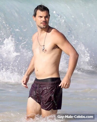 Taylor Lautner Shirtless On The Beach