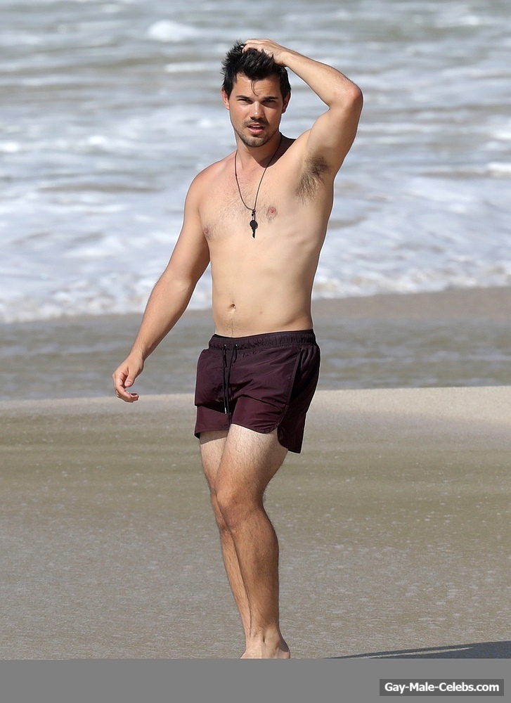 Taylor Lautner Shirtless On The Beach