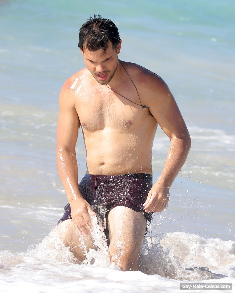 Taylor Lautner Shirtless On The Beach