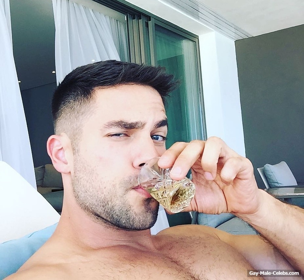 Brant Daugherty Relaxing Shirtless On A Beach