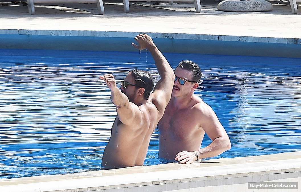 Luke Evans &amp; Victor Turpin Caught Shirtless In The Pool