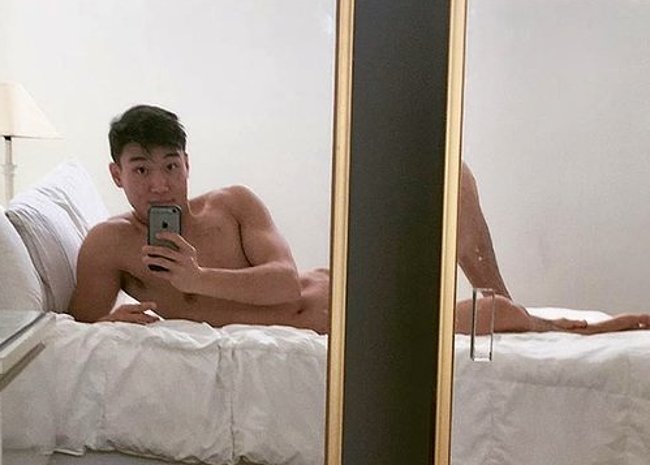 Joel Kim Booster is in the bedroom and he is flashing his fine ass around i...