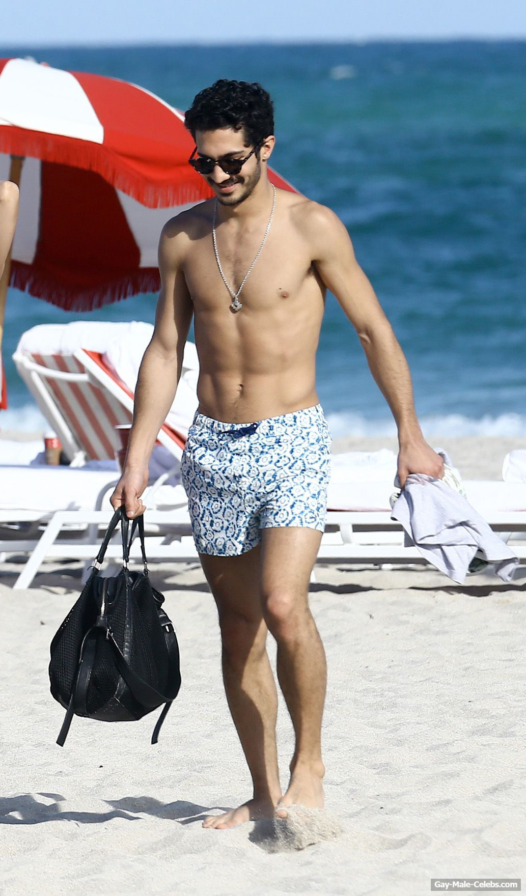 Chino Darin Shirtless Beach Photos