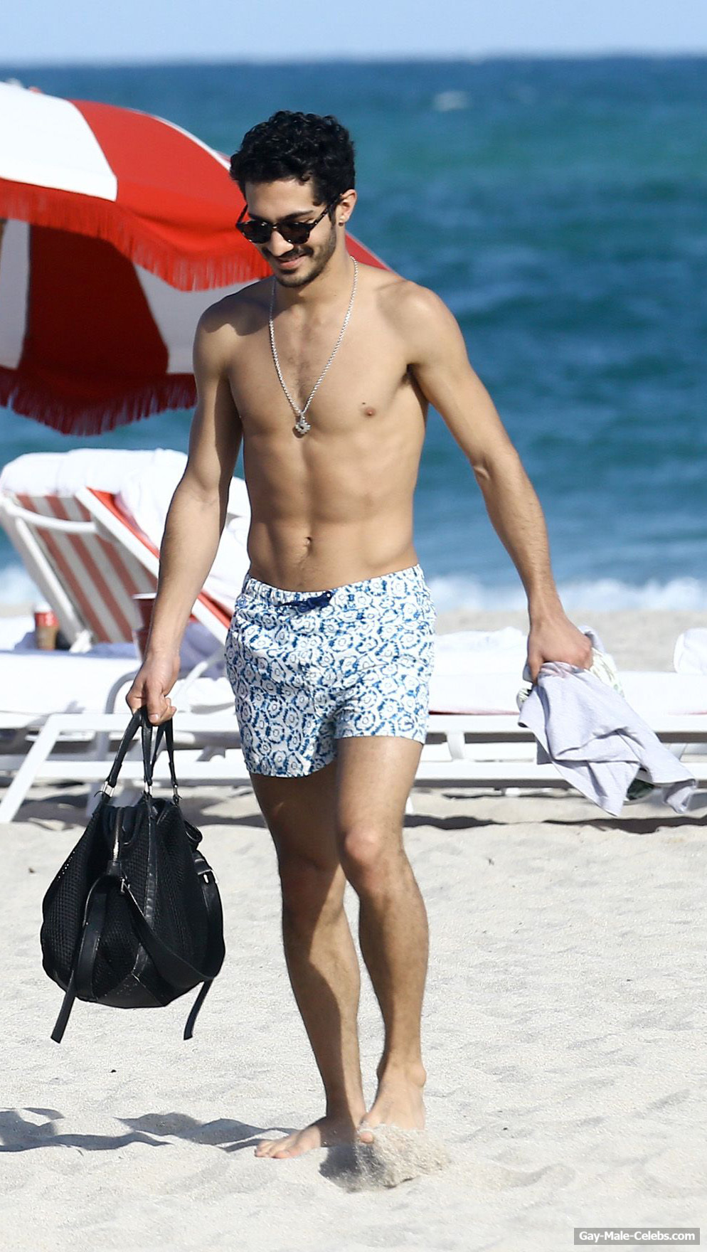 Chino Darin Shirtless Beach Photos