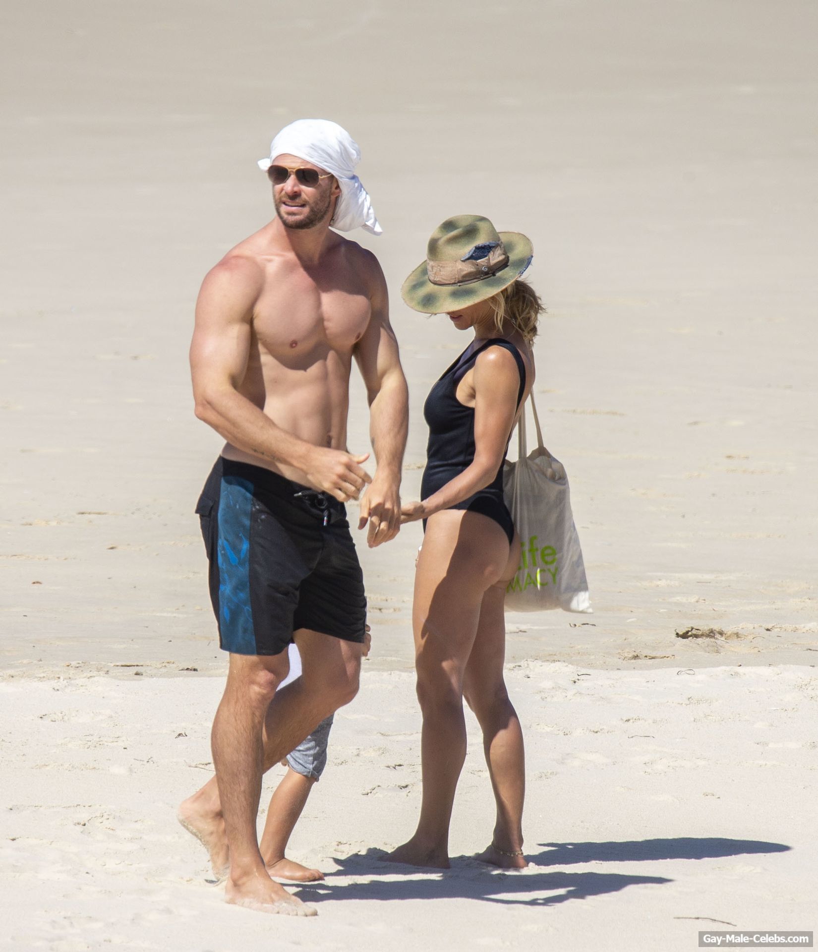 Chris Hemsworth Shirtless And Sexy With Family On A Beach