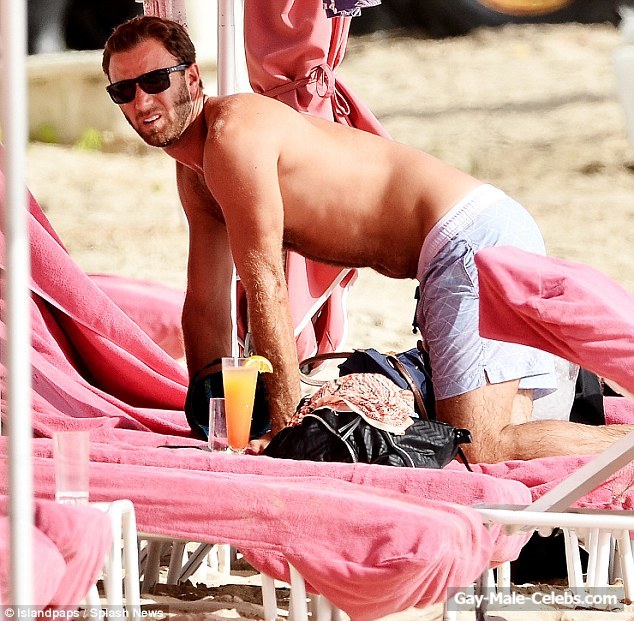 Dustin Johnson Sunbathing Shirtless On A Beach