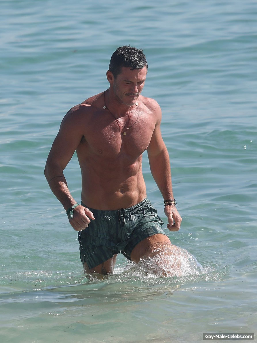 Luke Evans Sunbathing Shirtless On A Beach