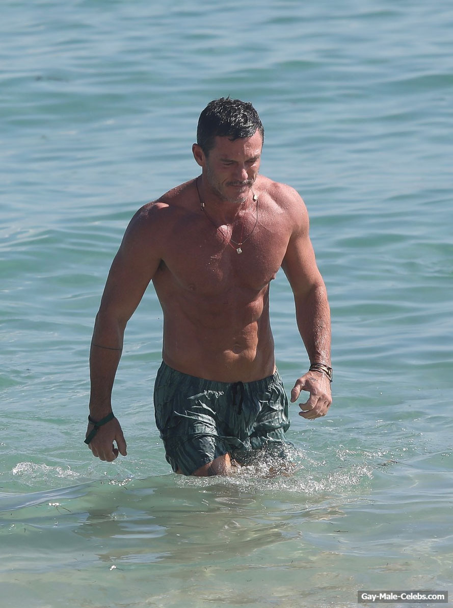 Luke Evans Sunbathing Shirtless On A Beach
