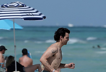 Joe Jonas beach photos
