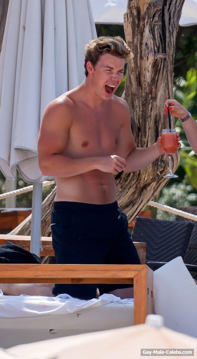 Will Poulter Sunbathing Shirtless On A Beach