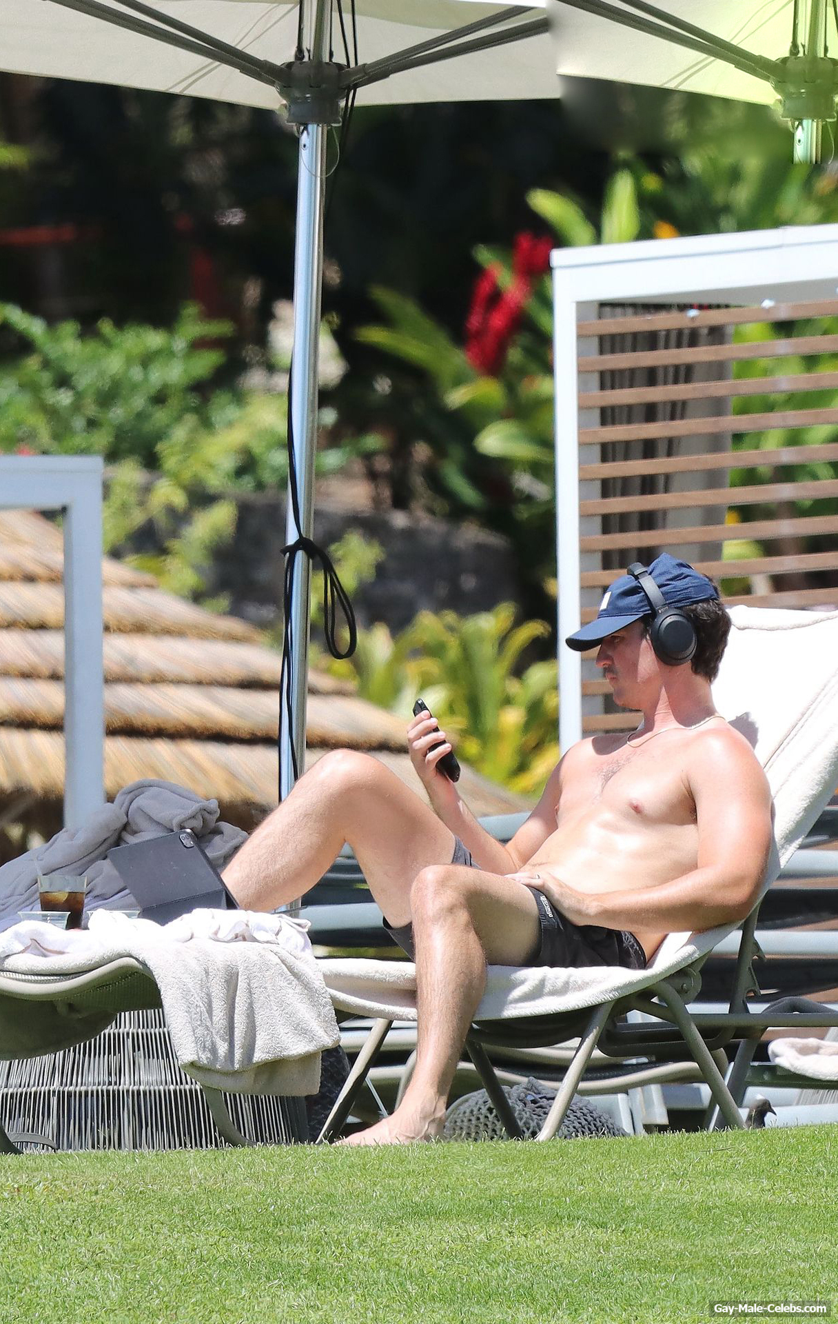 Miles Teller Caught Sunbathing Shirtless