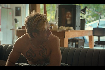 Glen Powell shirtless in Chad Powers
