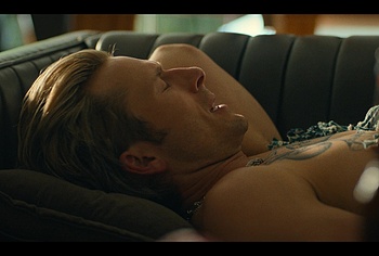 Glen Powell shirtless in Chad Powers