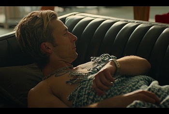 Glen Powell shirtless in Chad Powers