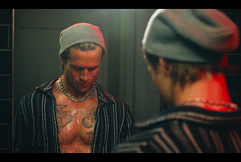 Glen Powell shirtless in Chad Powers