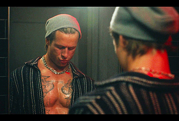 Glen Powell shirtless in Chad Powers