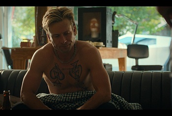 Glen Powell shirtless in Chad Powers