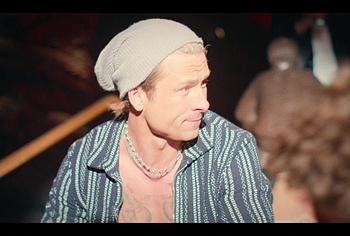 Glen Powell shirtless in Chad Powers