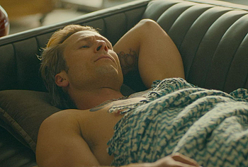 Glen Powell shirtless in Chad Powers