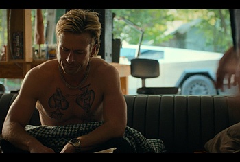 Glen Powell shirtless in Chad Powers