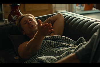 Glen Powell shirtless in Chad Powers