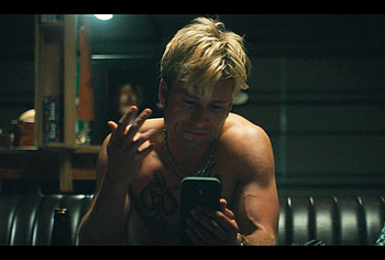 Glen Powell shirtless in Chad Powers