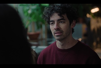 Joe Jonas shirtless in A Very Jonas Christmas Movie