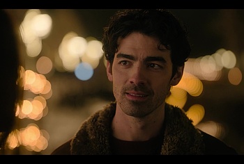 Joe Jonas shirtless in A Very Jonas Christmas Movie
