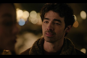 Joe Jonas shirtless in A Very Jonas Christmas Movie