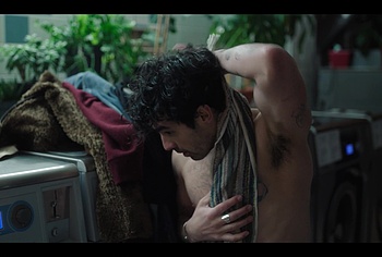 Joe Jonas shirtless in A Very Jonas Christmas Movie