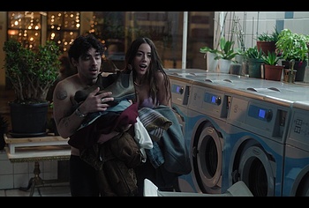 Joe Jonas shirtless in A Very Jonas Christmas Movie