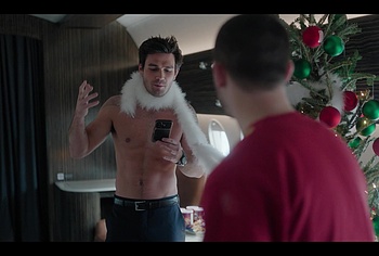 KJ Apa shirtless in A Very Jonas Christmas Movie