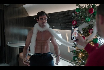KJ Apa shirtless in A Very Jonas Christmas Movie