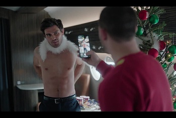 KJ Apa shirtless in A Very Jonas Christmas Movie