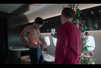 KJ Apa shirtless in A Very Jonas Christmas Movie