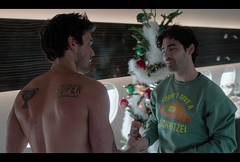 KJ Apa shirtless in A Very Jonas Christmas Movie