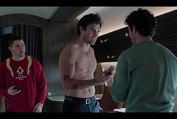 KJ Apa shirtless in A Very Jonas Christmas Movie