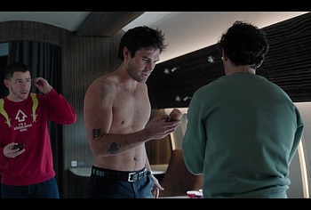 KJ Apa shirtless in A Very Jonas Christmas Movie