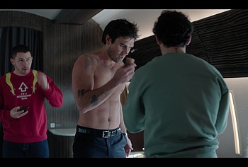 KJ Apa shirtless in A Very Jonas Christmas Movie