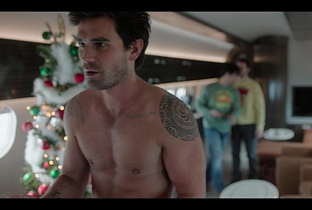KJ Apa shirtless in A Very Jonas Christmas Movie