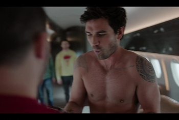 KJ Apa shirtless in A Very Jonas Christmas Movie