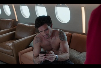 KJ Apa shirtless in A Very Jonas Christmas Movie