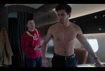 KJ Apa shirtless in A Very Jonas Christmas Movie