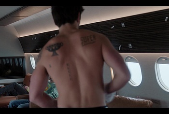 KJ Apa shirtless in A Very Jonas Christmas Movie