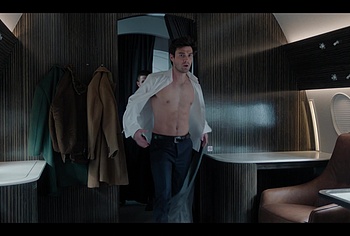 KJ Apa shirtless in A Very Jonas Christmas Movie