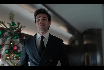 KJ Apa shirtless in A Very Jonas Christmas Movie