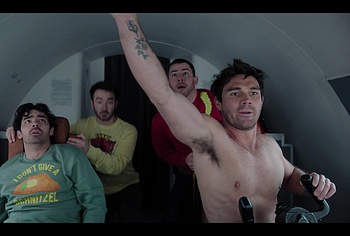 KJ Apa shirtless in A Very Jonas Christmas Movie