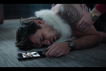 KJ Apa shirtless in A Very Jonas Christmas Movie