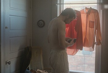 Josh O'Connor shirtless in The Mastermind