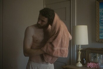Josh O'Connor shirtless in The Mastermind